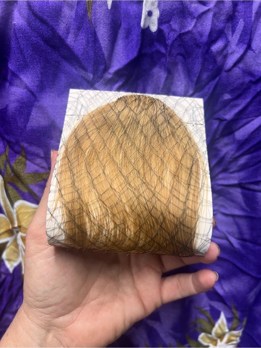 Reddish blonde clip on bangs